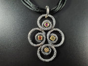 Collana in argento a cerchi lavorati e Zirconi Cubici
